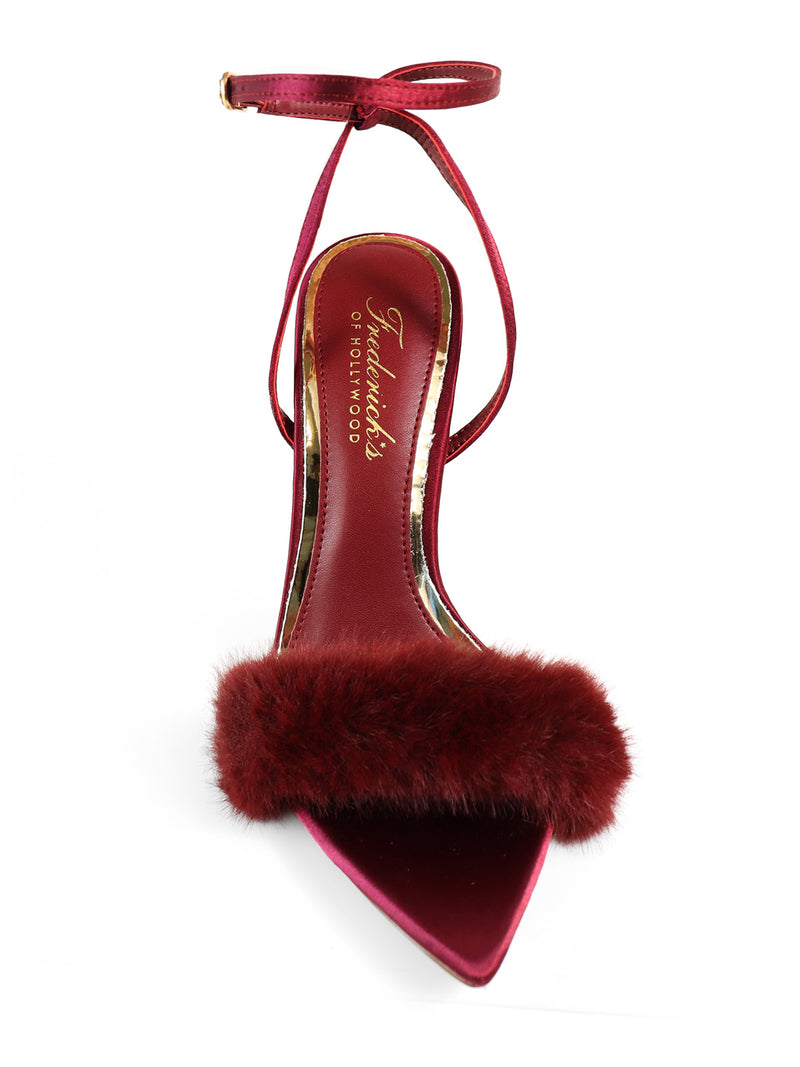 The Aileen Pointed Toe Heel by Frederick's of Hollywood is a deep red high heel with a pointed toe, ankle strap, fluffy faux fur front band, and gold-branded insole.