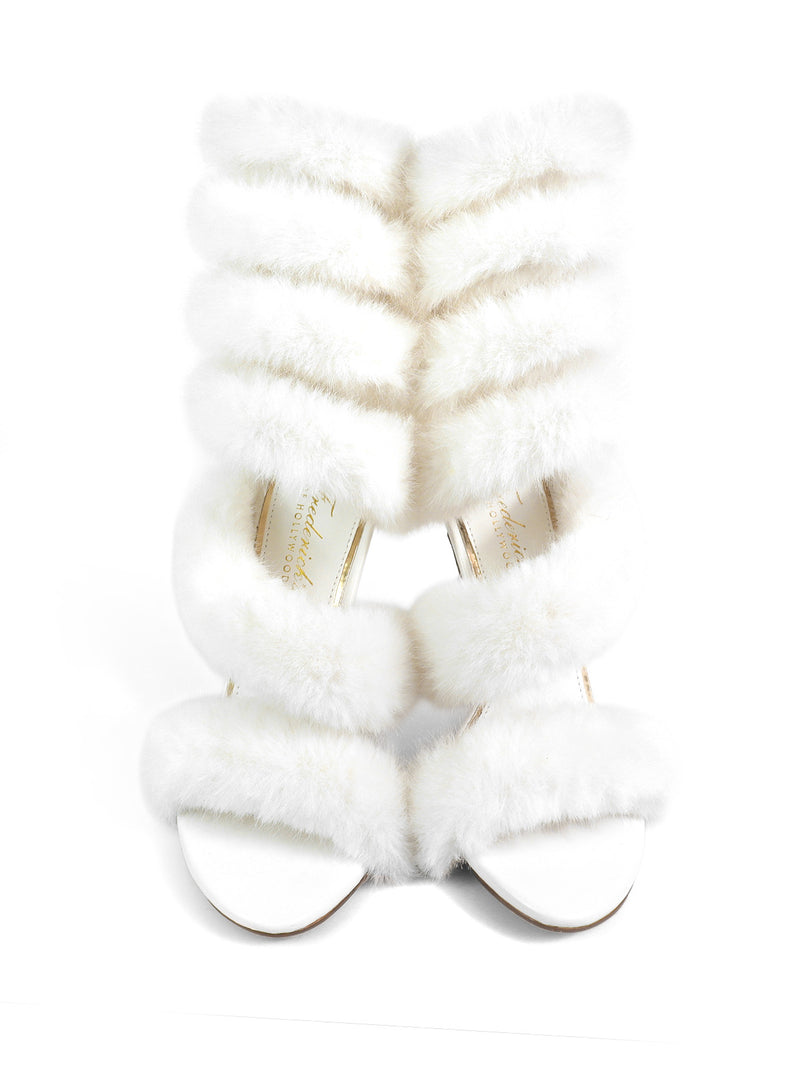 The Allure Fluffy Stiletto Sandal by Frederick's of Hollywood is a pair of white heels with multiple faux fur straps across the front and ankle, creating a glamorous statement look, shown on a white background.