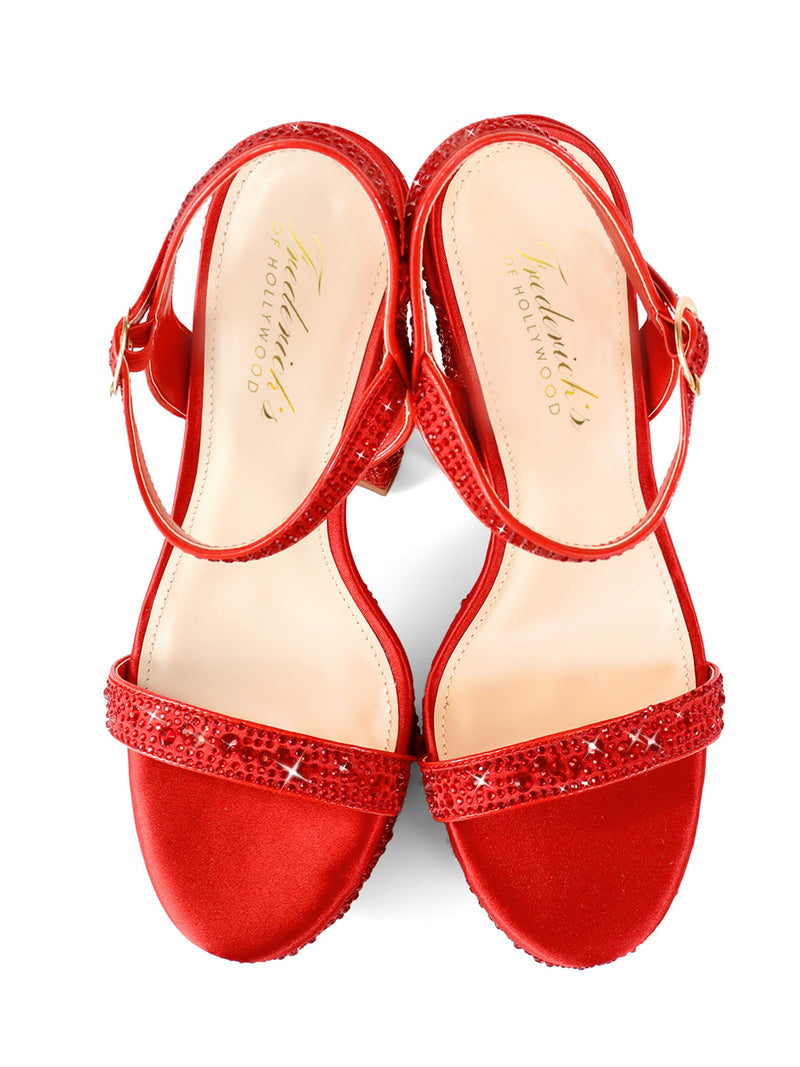 The Frederick's of Hollywood Fabiosa Rhinestone Open Toe Platform Heel features red ankle straps, sparkling rhinestones on the front straps, and a beige insole with gold branding—perfect for glamorous evening wear.