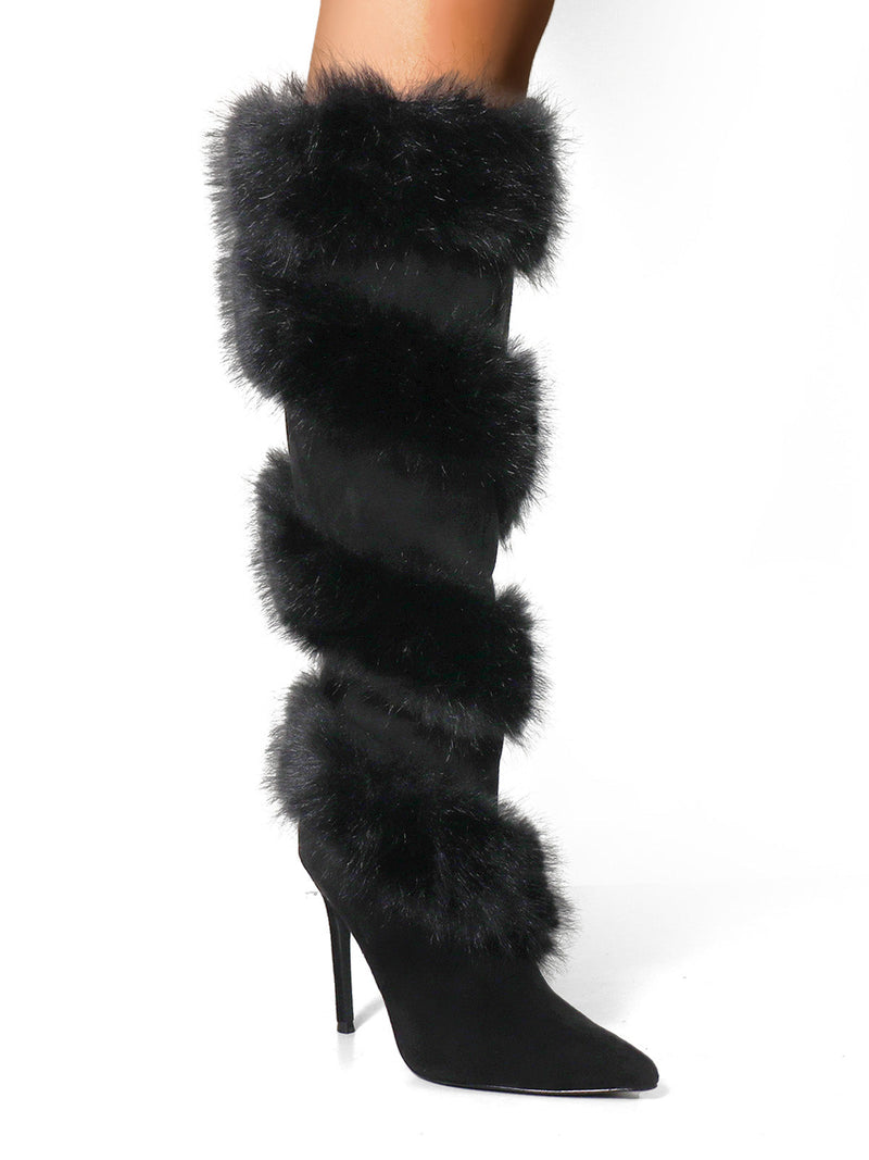 The Holly Feather Over the Knee High Boots by Frederick's of Hollywood feature black faux fur bands and a pointed toe, creating a bold, fashion-forward look shown worn against a white background.