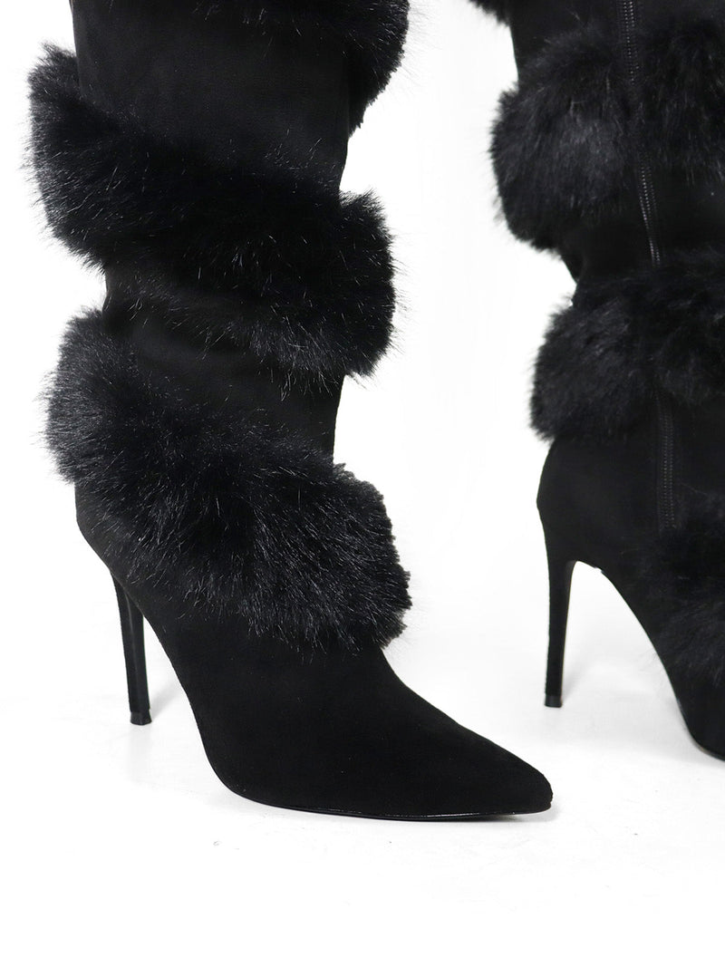 Close-up of Frederick's of Hollywood Holly Feather Over the Knee High Boots featuring pointed toes and thick black fur trim around the legs and ankles, set against a white background.