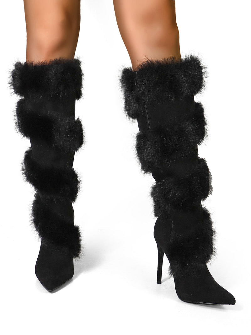 Step out in style with Frederick's of Hollywood Holly Feather Over the Knee High Boots—black, high-heeled boots featuring five bands of fluffy black fur and pointed toes, ideal for bold, fashion-forward looks.