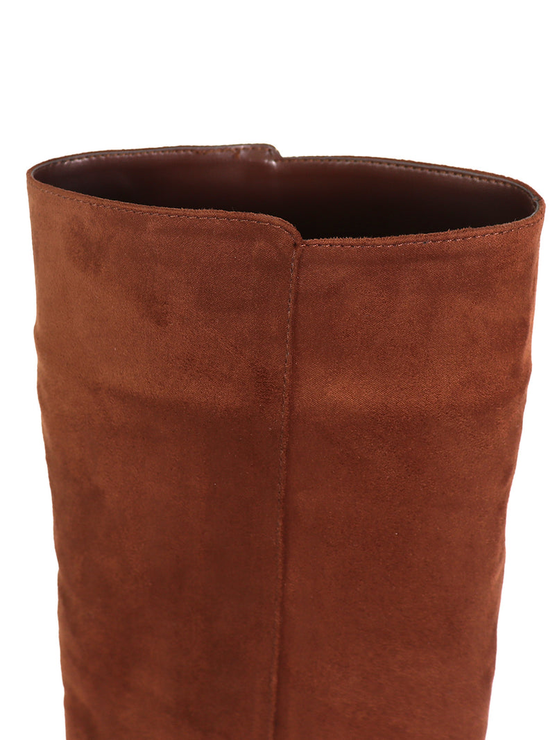 Close-up of the upper section of the Janeth Ankle Heel Boots by Frederick's of Hollywood, featuring brown suede with vertical stitching and a smooth, slightly rounded opening, highlighting the refined craftsmanship characteristic of these stylish ankle boots.