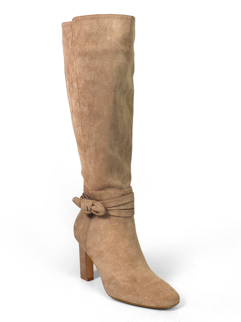 Frederick's of Hollywood Janeth Ankle Heel Boots in tan suede, featuring a chunky heel and an elegant knot detail at the ankle, reminiscent of classic suede ankle boots, shown on a white background.