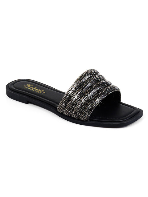The Jennifer Rhinestone Slide Sandals by Frederick's of Hollywood feature a single wide black strap adorned with sparkling rhinestones, a black footbed, and gold branding on the heel, shown against a white background.