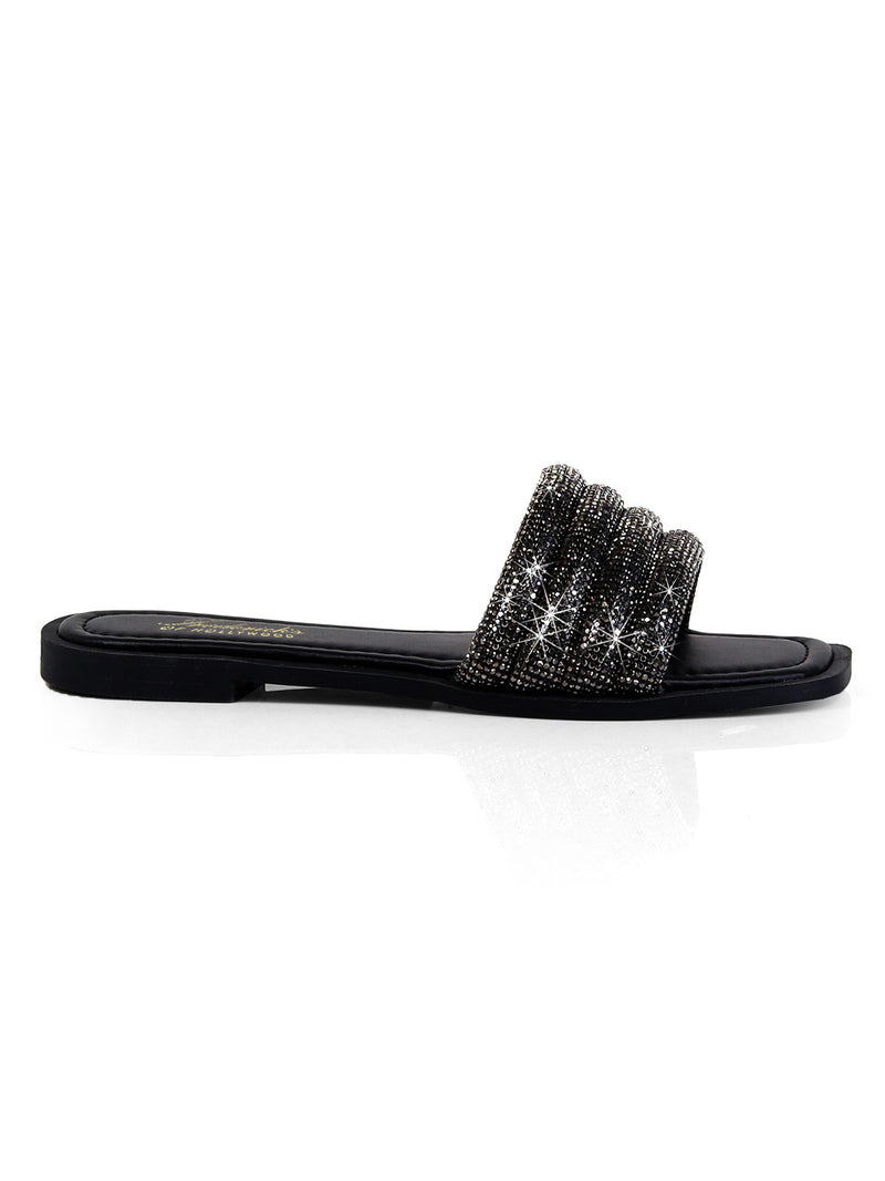 The Jennifer Rhinestone Slide Sandals by Frederick's of Hollywood feature a black design with a wide, sparkling rhinestone strap and a slim sole for effortless style.