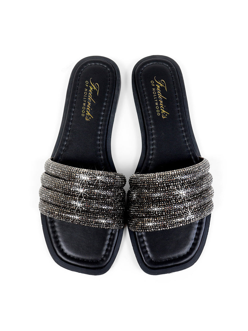 The Jennifer Rhinestone Slide Sandals by Frederick's of Hollywood feature wide, rhinestone-covered straps and padded soles in black, showcased on a white background.