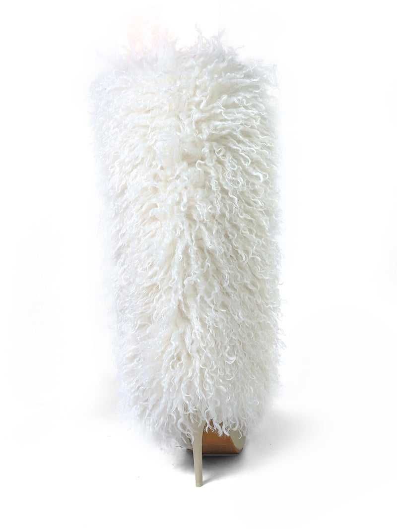 The Frederick's of Hollywood Kiki Pointed Toe Fluffy Boot is a fashion-forward high heel, covered in long, curly white faux fur and set against a plain white background.