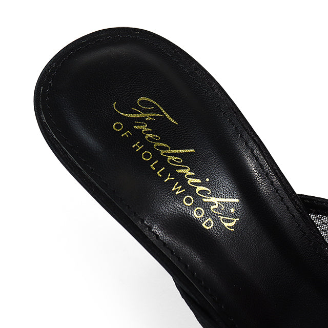 Close-up of a black insole with gold "Frederick's of Hollywood" script, designed to pair perfectly with the Lacey Pointed Toe Lace Bow Heels.