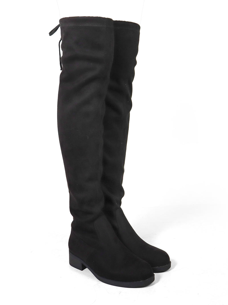 A pair of black Letizia Thigh High Super Stretch Boots by Frederick's of Hollywood, crafted in suede with low block heels and a delicate back tie, are displayed against a white background. These boots provide a sleek silhouette and all-day comfort.