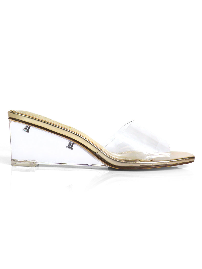 The Lora Transparent Mule Wedges by Frederick's of Hollywood feature clear straps and heels, a beige footbed, and an open toe for a chic, minimalist look.