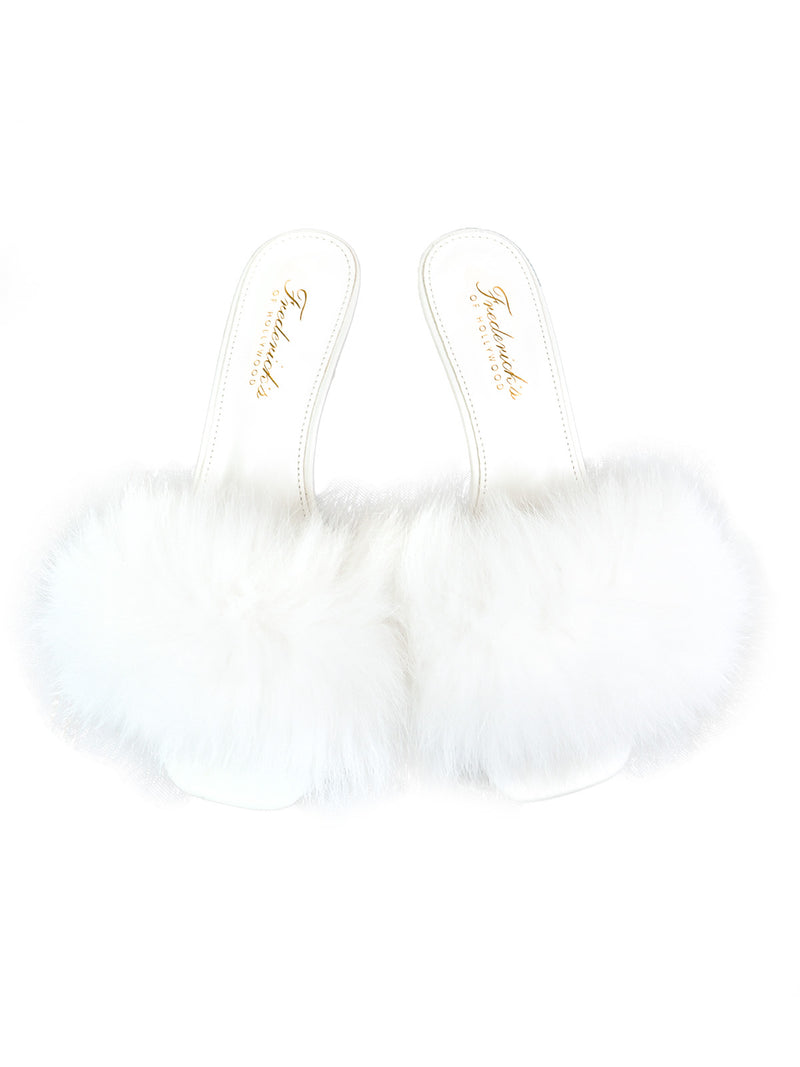 The Purr Square Toe Fur Heel by Frederick’s of Hollywood is a pair of white, fluffy open-toe slippers with high heels and marabou feather trim, featuring a chic square-toe silhouette for a fresh take on the classic statement heel; shown on a white background.