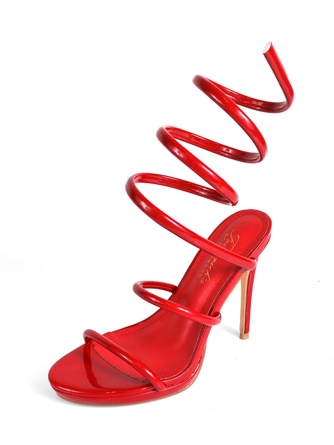 The Sabine Round Toe Heel by Frederick's of Hollywood features a glossy red finish, three slim straps over the round toe and foot, and a striking spiral strap wrapping the lower leg, all showcased against a white background.