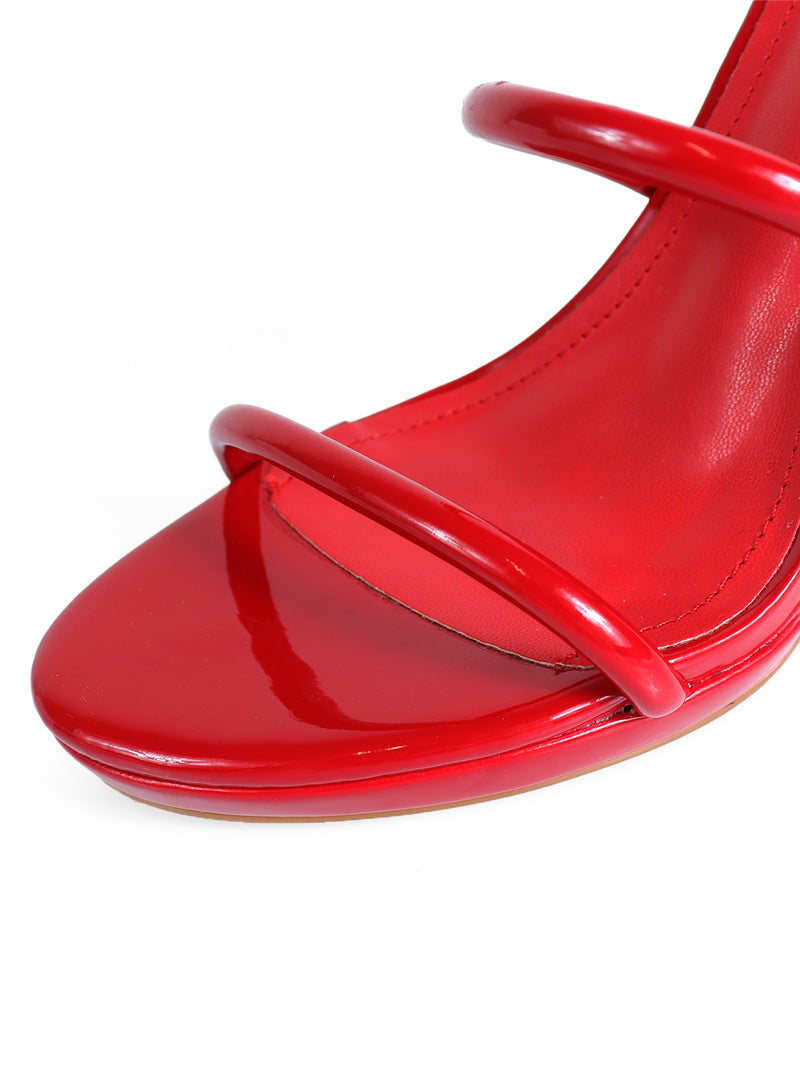 Close-up of the Sabine Round Toe Heel by Frederick's of Hollywood, featuring a glossy red finish, two slim toe straps, an open toe design, and an elegant silhouette.