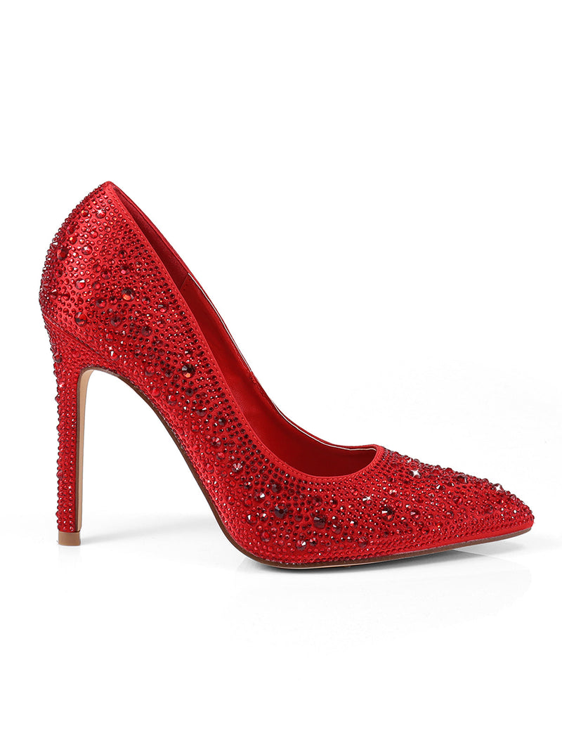 The Samantha Pump by Frederick's of Hollywood is a single luxury heel with sparkling red rhinestones, a pointed toe, and a tall slim heel, shown against a plain white background.