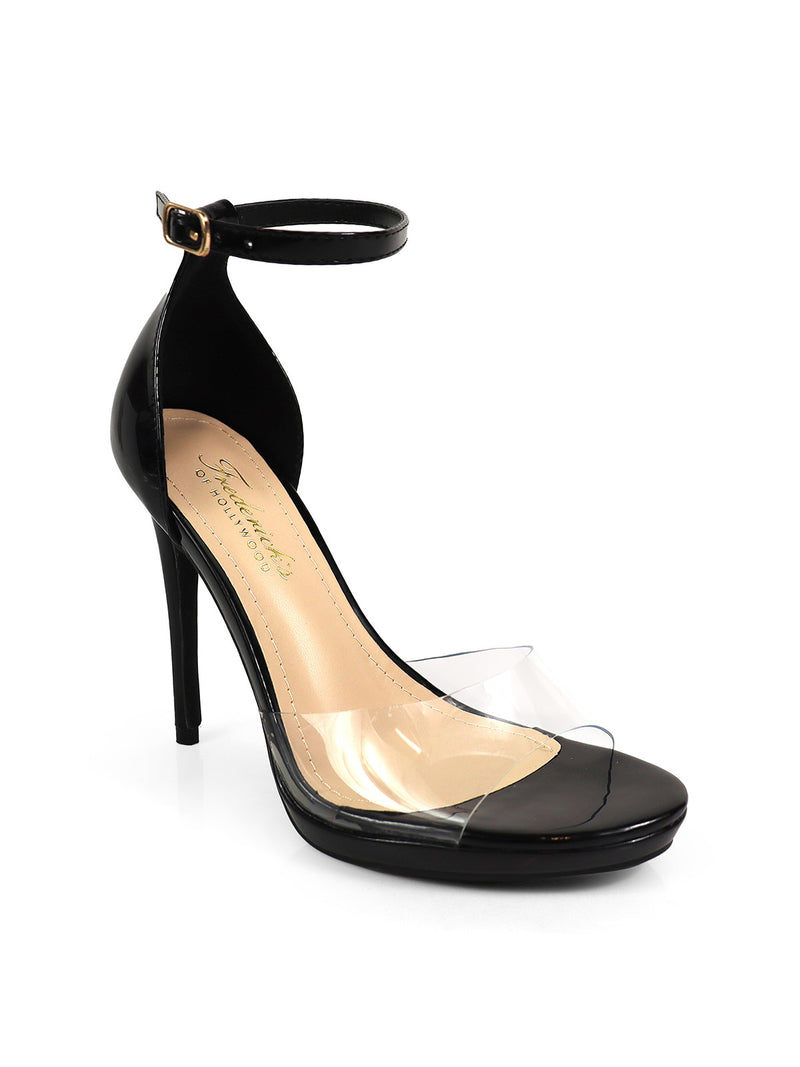 The Stacy Ankle Strap Heels by Frederick's of Hollywood feature a black high-heel, clear PVC toe strap, ankle strap, beige insole, and glossy finish—elegant footwear perfect for any occasion.