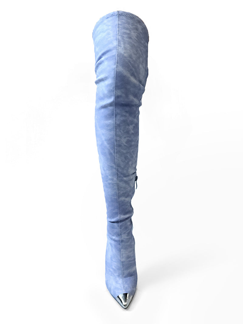 A single Una Thigh High Boot by Frederick's of Hollywood in light blue, featuring a metal toe cap and pointed toe, is displayed against a plain white background.