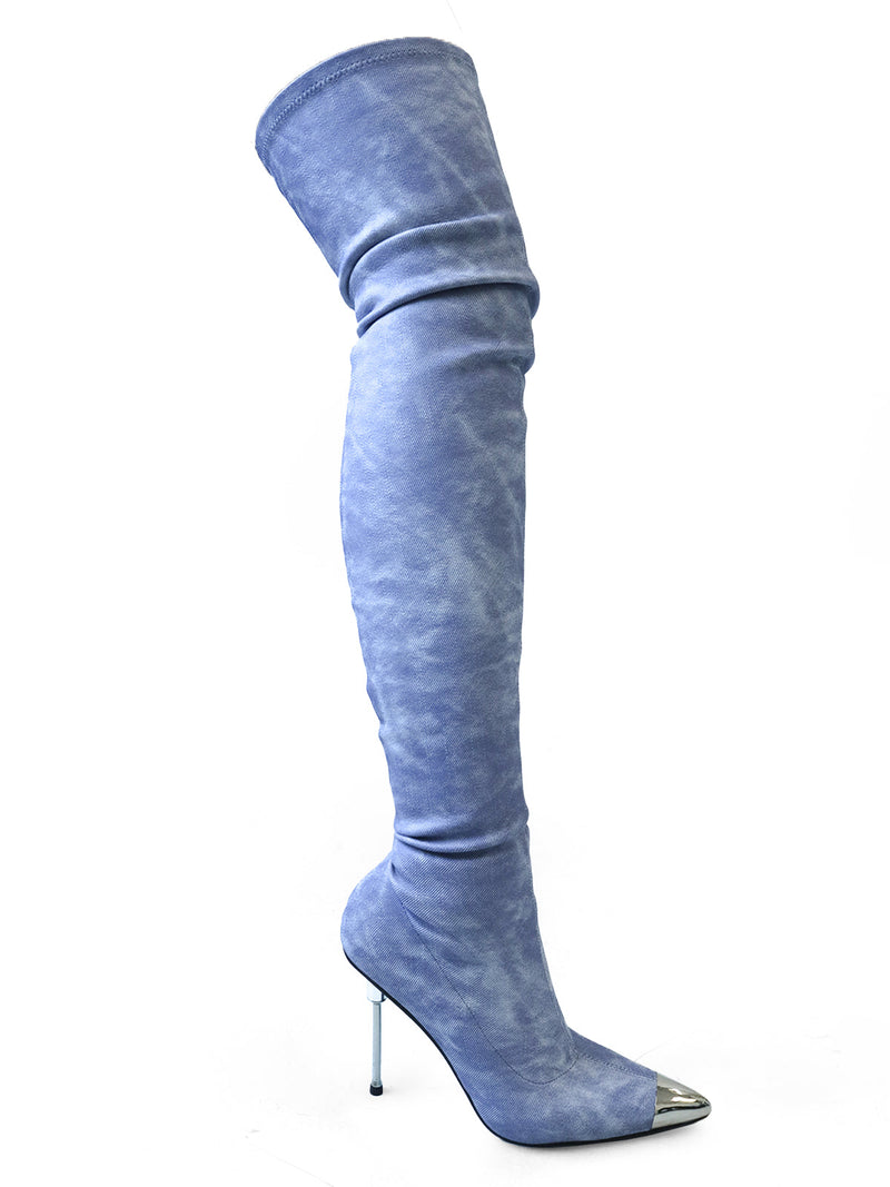 The Una Thigh High Boots by Frederick's of Hollywood are light blue suede stilettos featuring a slim high heel and bold metal toe cap—perfect for fans of pointed-toe boots.