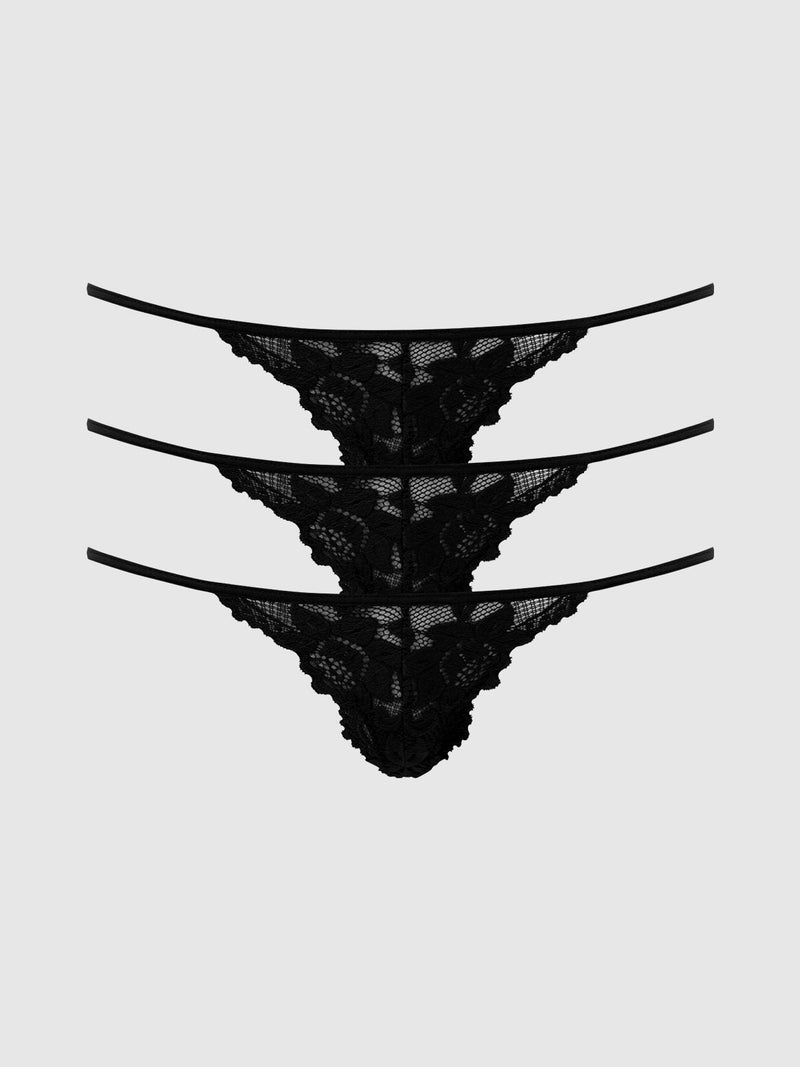 The Jessica Lace Mini G-String 3 Pack by Frederick's of Hollywood features three black lace panties stacked horizontally on a light gray background, offering a stylish and versatile lingerie set.