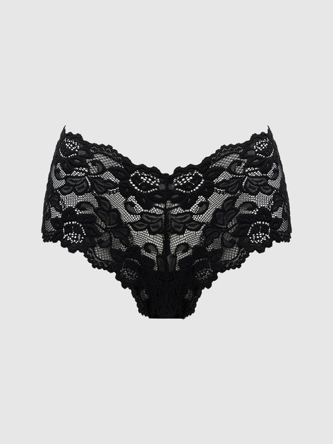 The Jessica Lace Cheeky by Frederick's of Hollywood features black floral lace, a high-waisted fit, and scalloped edges, showcased against a plain light gray background.