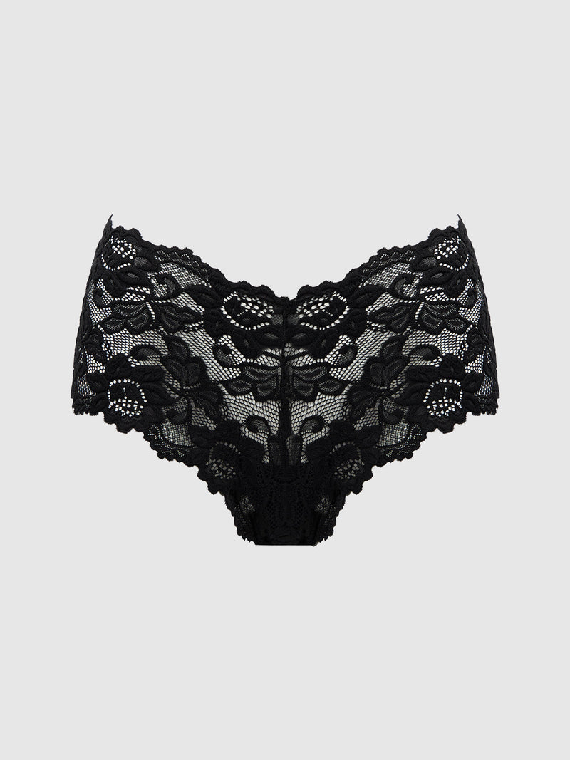 The Jessica Lace Cheeky by Frederick's of Hollywood features black floral lace, a high-waisted fit, and scalloped edges, showcased against a plain light gray background.