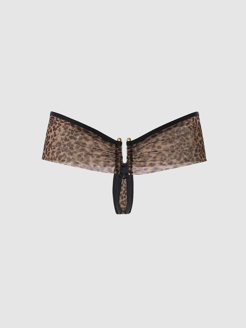 The Frederick's of Hollywood Alanza Ultra Fine Mesh Hardware Thong set features a leopard print bandeau bra with a gold center clasp and black trim, paired with a matching ultra fine mesh thong, shown on a plain light gray background.
