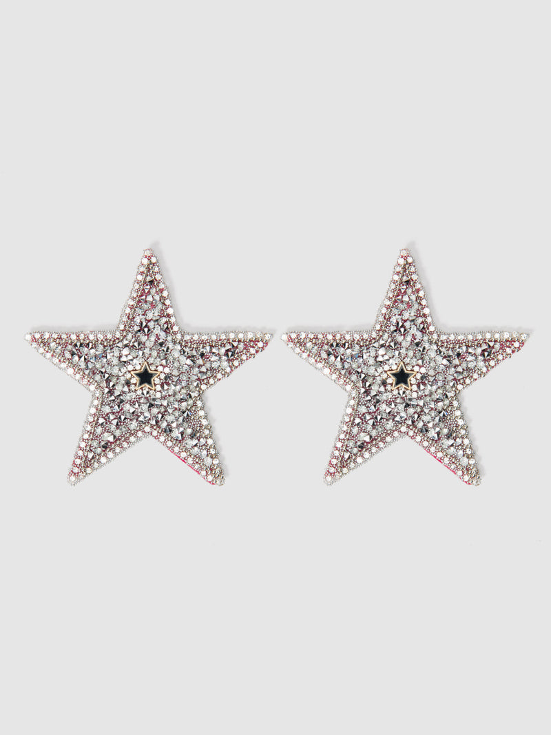 The Ziggy Rhinestone & Sequin Star Pasties by Frederick's of Hollywood, sparkling with rhinestones and featuring a gold star center, are shown on a plain light gray background.