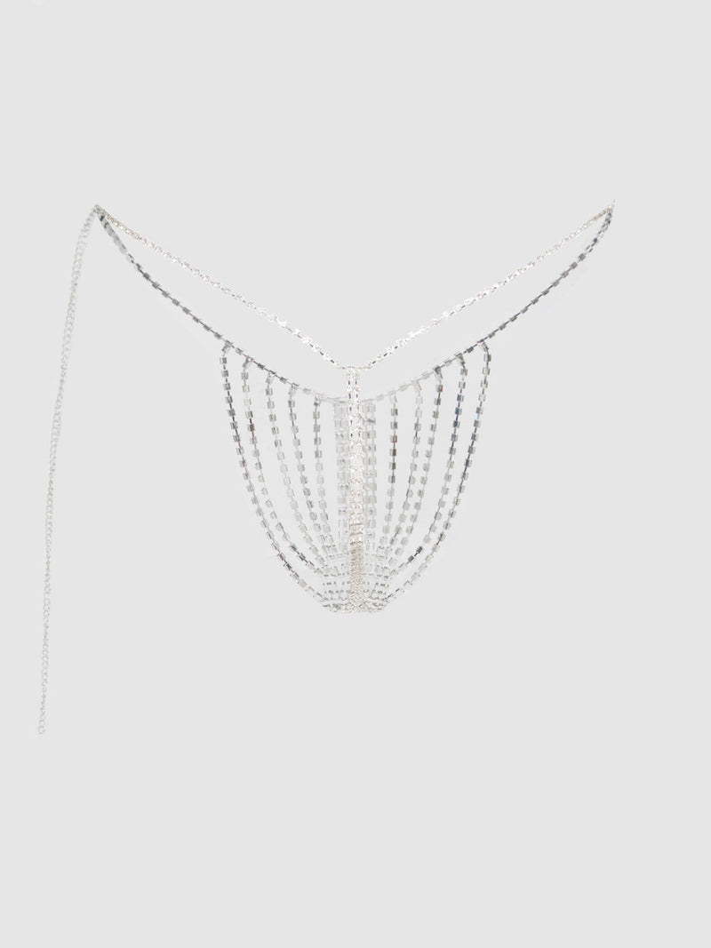The Frederick's of Hollywood Ziggy Rhinestone Vertical Thong features silver chains and cascading rhinestones in a V-shaped design, reminiscent of a rhinestone-studded thong, displayed against a plain gray background.