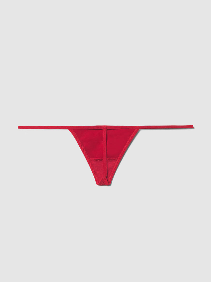 The Exxtreme Microfiber Mini G-String by Frederick's of Hollywood is a red thong-style sexy underwear with thin side straps, shown against a white background.