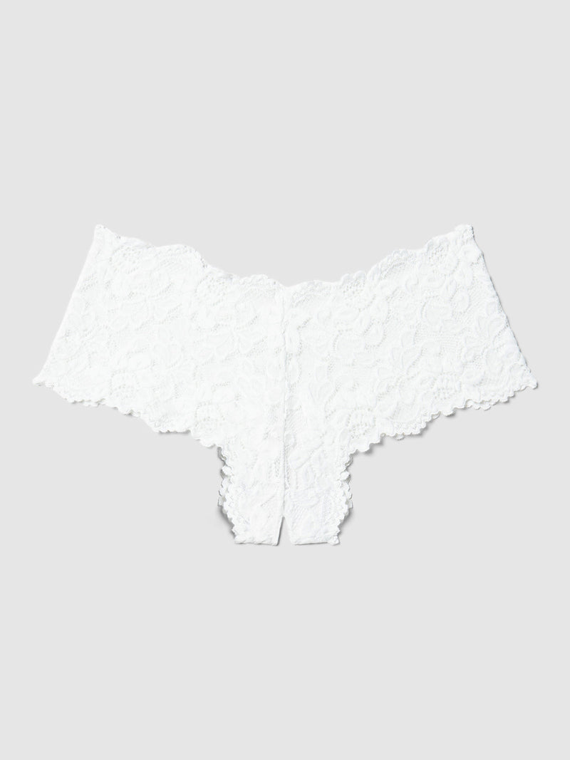 The Frederick's of Hollywood Jessica Lace Crotchless Cheeky is a white women's boyshort underwear with a floral stretch lace pattern, shown flat on a light gray background.